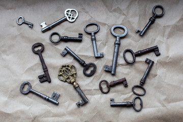 Old keys on paper surface