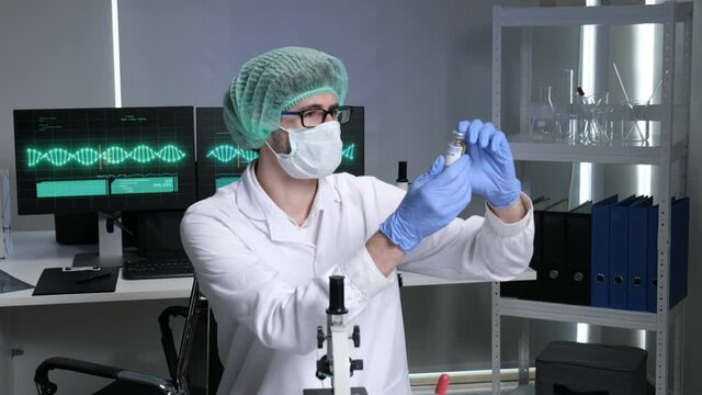 Scientists are researching for Covid19 vaccine in a laboratory. Doctors are testing  a new phamaceutical.