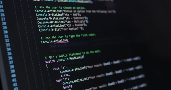 Text on laptop screen. The programmer writes the code.coding program programming developer compute web development work design software closeup desk write workstation key password theft hacking.