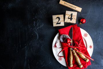 Overhead view of a Christmas place setting on a table