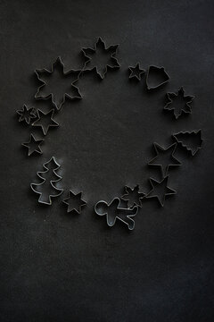 Christmas metal cookie cutters arranged in a circle
