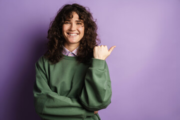 Close up of an excited happy young woman in casual wear