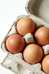 fresh brown eggs in carton box