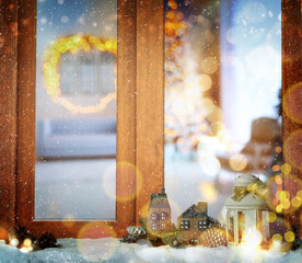 Beautiful composition with Christmas lantern near window