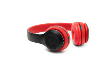Red wireless Bluetooth headphones isolate on white background.