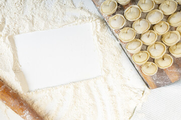 homemade dumplings in the kitchen without decorations. making dumplings with minced pork, beef and chicken