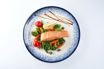 salmon steak with roasted vegetables