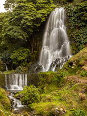 Wonderful waterfall at Azores travel destination, Sao Miguel island.
