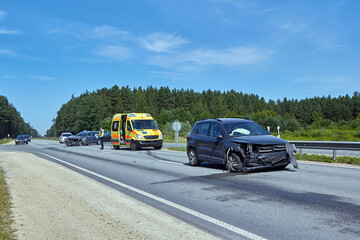 Damaged front side of car after accident on a road