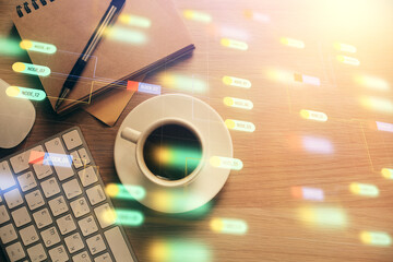 Double exposure of technology theme drawing over work table desktop. Top view. Global data analysis concept.