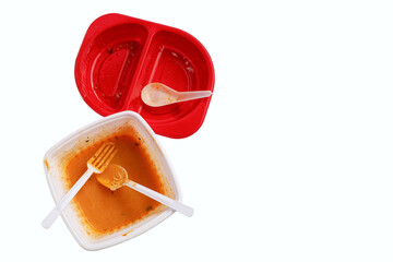 Used food box, disposable plastic containers isolated on white background. Top view, with copy...