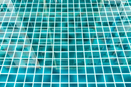 Green porcelain tiles in the swimming pool texture and background seamless