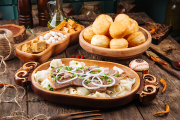 Kazakh traditional dish beshbarmak with horse meat and boiled dough