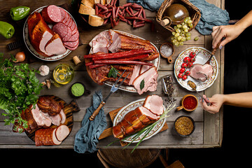 
smoked meat and sausages in assortment on the table