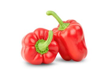 two red bell peppers on isolated white background