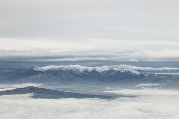 Fototapeta na wymiar snowed mountains from a plane