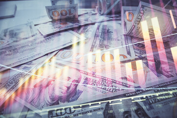Multi exposure of forex chart drawing over us dollars bill background. Concept of financial success markets.