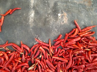 red hot chili peppers on wooden background