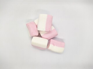 pink and white colors marshmallow on a white background