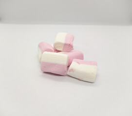 pink and white colors marshmallow on a white background