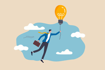 Big idea to solve business problem, invention or innovation to drive business growth or work achievement concept, smart businessman manager holding light bulb floating balloon flying high in the sky.