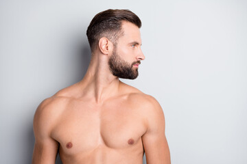 Fototapeta premium Photo of young handsome stubble man muscular naked haircut shampoo look empty space isolated over grey color background