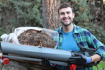 Cleaning service guy using leaf blower 