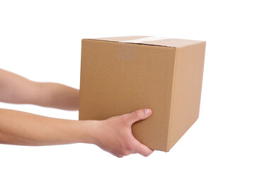 close up of hands giving cardboard box isolated on white
