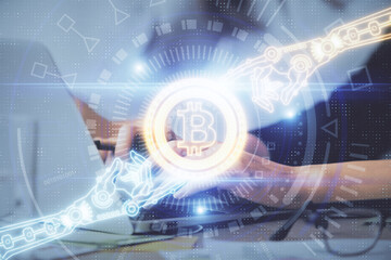 Double exposure of woman hands typing on computer and crypto market theme hologram drawing. Blockchain concept.