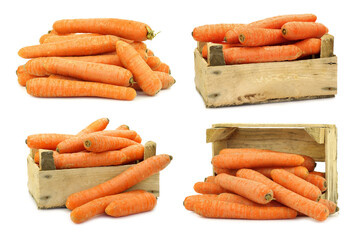 fresh winter carrots in a wooden crate on a white background