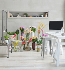 Flower shop with many colorful plant in the vase style, tool, computer style.