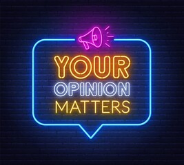 Your opinion matters neon sign on brick wall background .