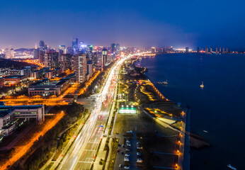 Aerial photography of the night view of the urban architectural landscape of Qingdao, China
