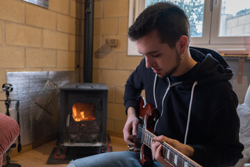 Man playing the guitar chimney