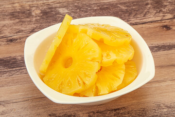 Marinated pineapple rings in the bowl