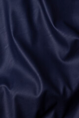 Fototapeta premium Background. Texture. Blue imitation leather. Close-up.