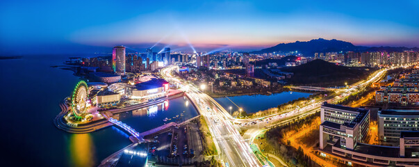 Obraz premium Aerial photography of the night view of the urban architectural landscape of Qingdao, China