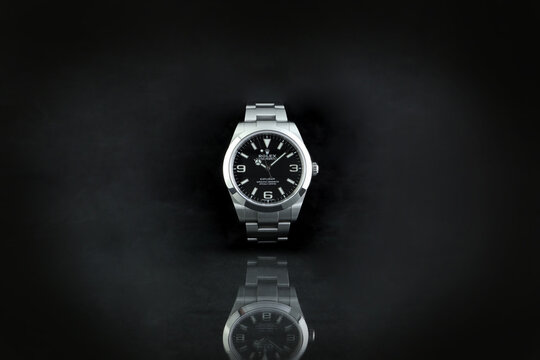 The Rolex vintage wristwatch model oyster perpetual explorer I display on the black background in the luxury watch shop
