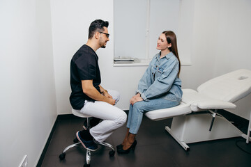 Young woman patient have consultation with doctor before exam