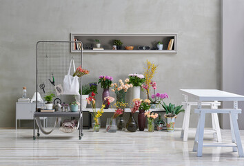 Flower shop with many colorful plant in the vase style, tool, computer style.