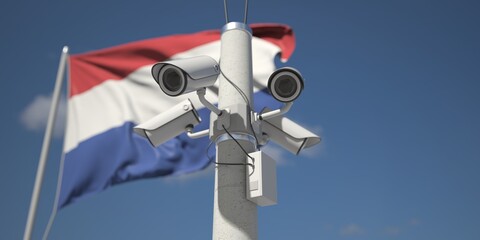Naklejka na ściany i meble Security cameras near flag of the Netherlands, 3d rendering