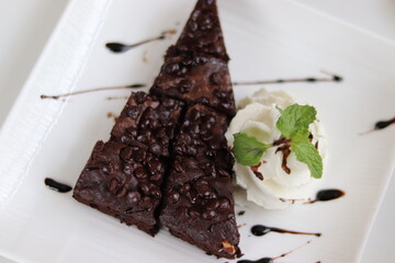 Brownie cake in a white plate.