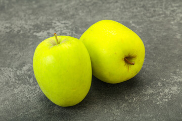 Two ripe green sweet apples