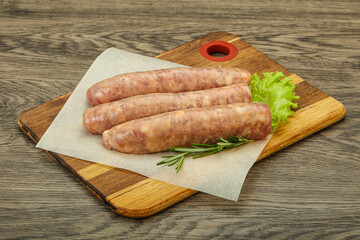 Raw pork meat sausages for grill