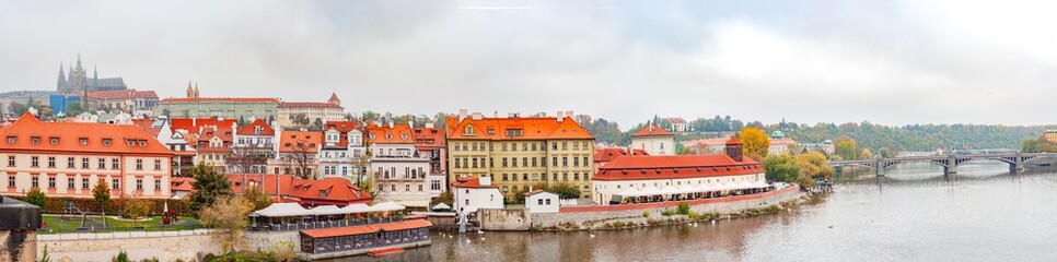 Naklejka na ściany i meble Panorama beautiful city, capital Czech Republic, Prague. Vltava river with ancient bridges.