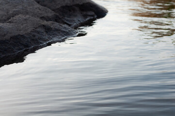 Blurred background, water surface close-up, beautiful abstract background, fast flowing river.