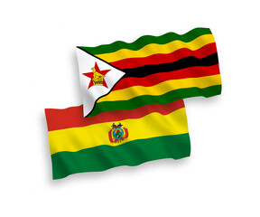 Flags of Bolivia and Zimbabwe on a white background