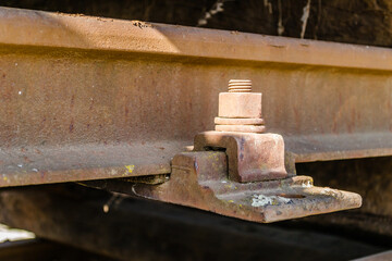 Old screws on slippers, railway sleepers, railway sleepers in the railway station Petrovaradin, Novi Sad, Serbia 