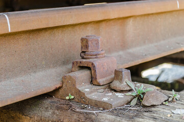 Old screws on slippers, railway sleepers, railway sleepers in the railway station Petrovaradin, Novi Sad, Serbia 