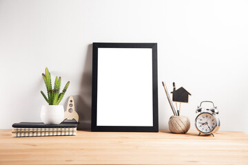 photo frame with clock on table